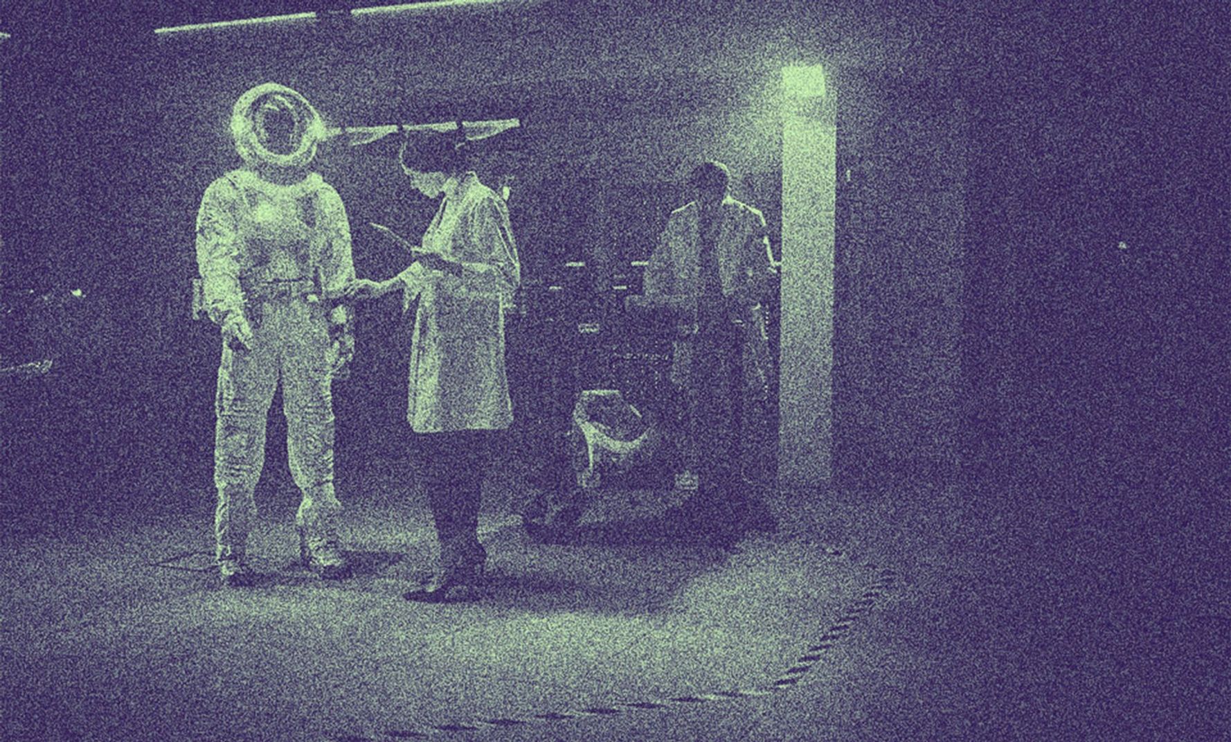 An astronaut is being prepared for launch.