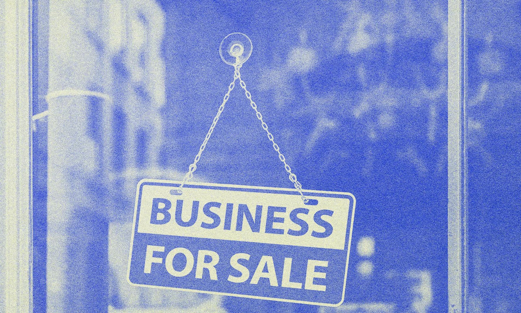 Front of a store with a sign on the glass door.