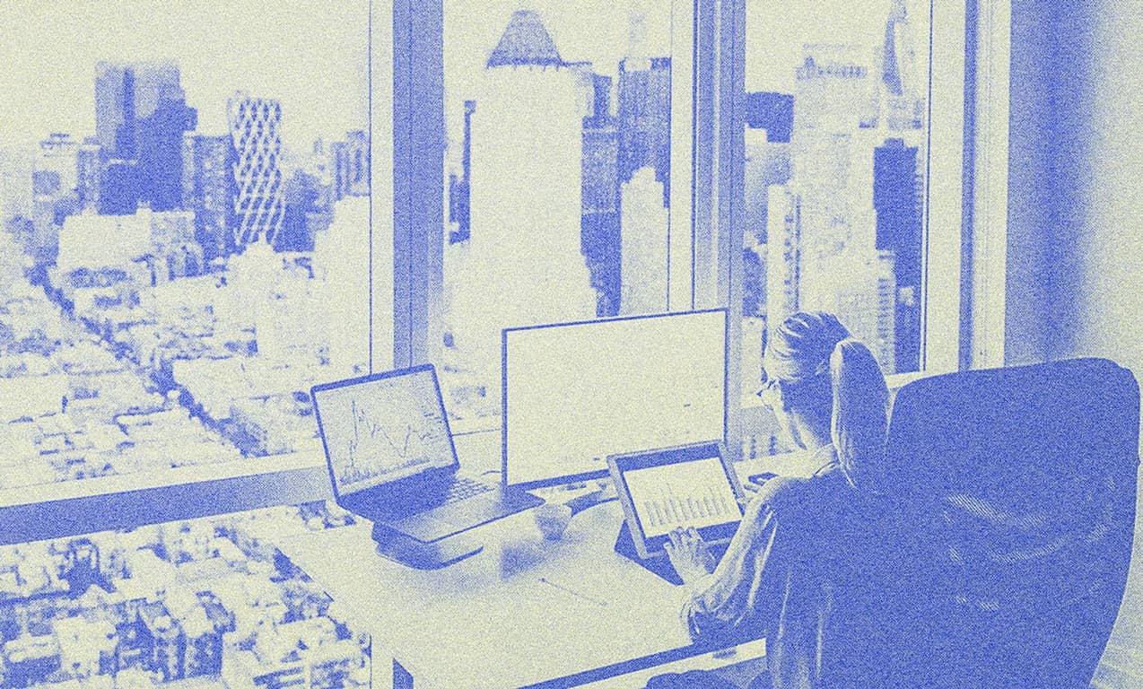 A woman working on her computer.