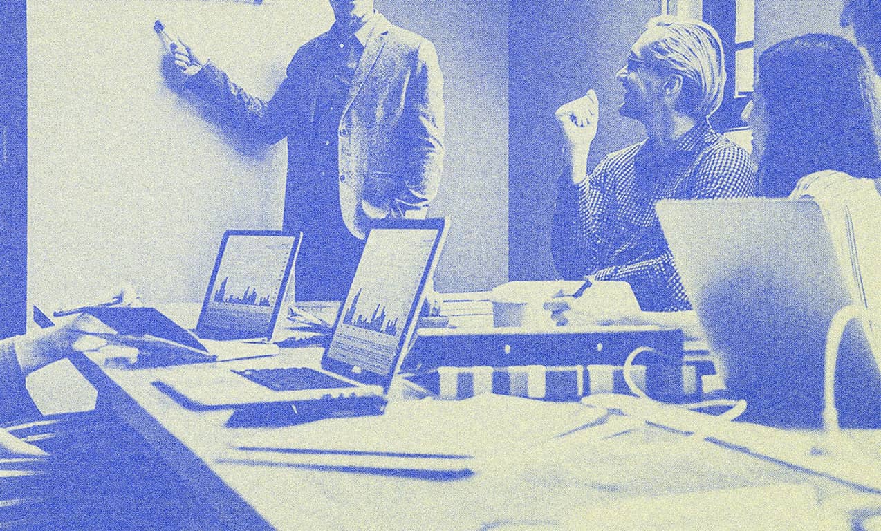 Office workers in a meeting.