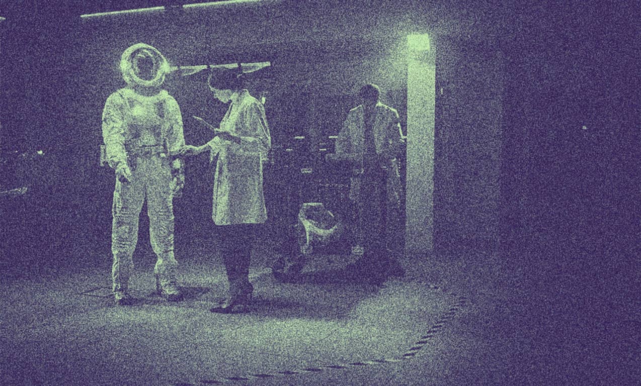 An astronaut is being prepared for launch.