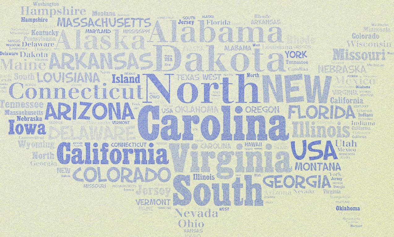 Names of various US states written on a piece of paper