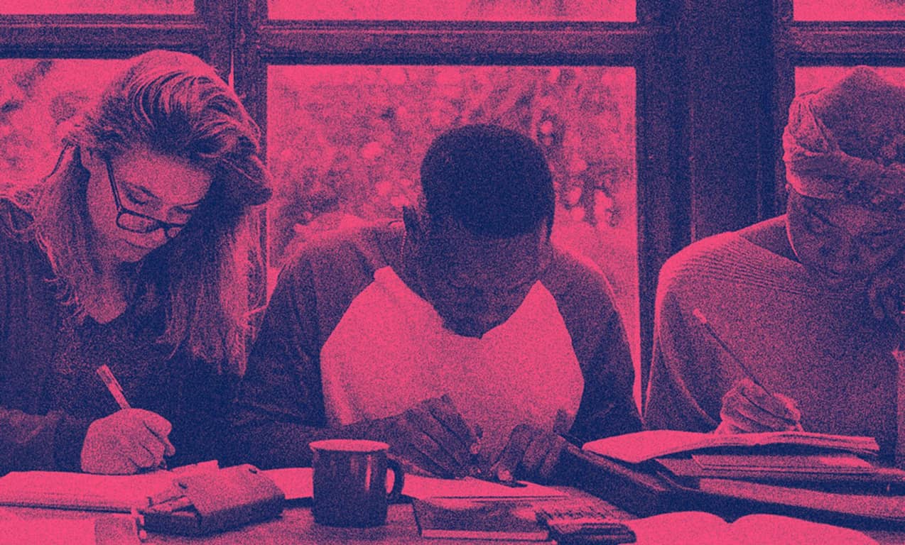 3 student studying side by side