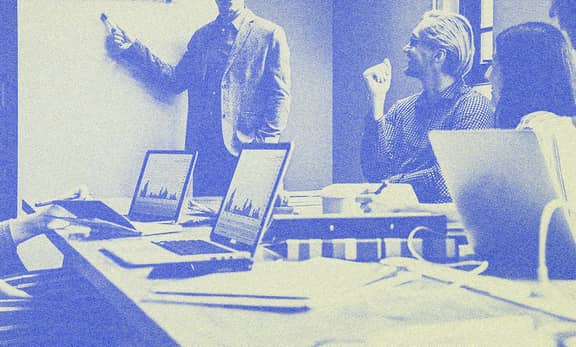 Office workers in a meeting.