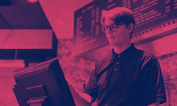 A student working at a counter.