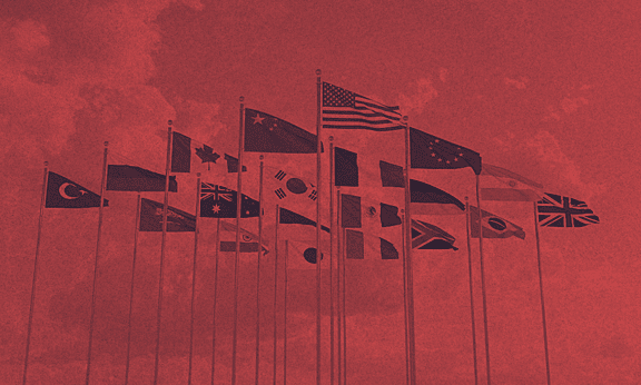 A group of flag poles together.