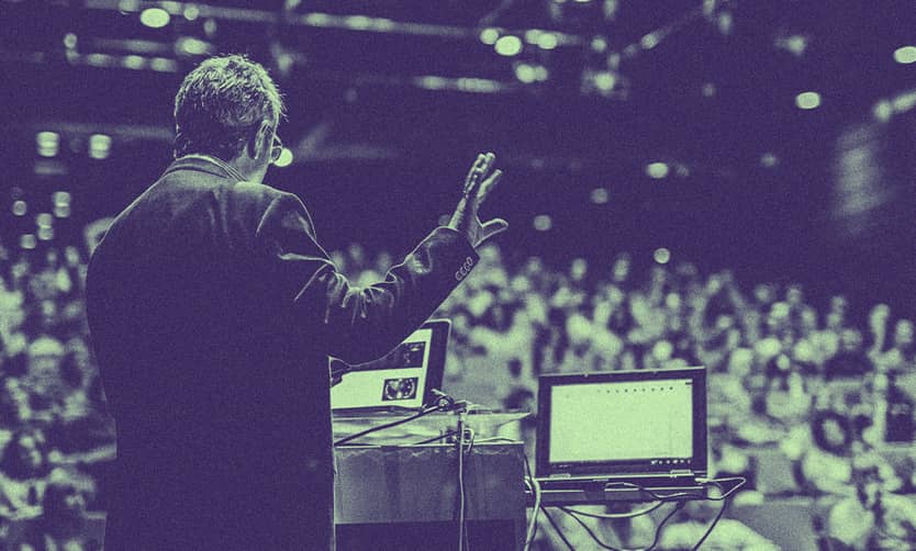 An academic lecturing a class.