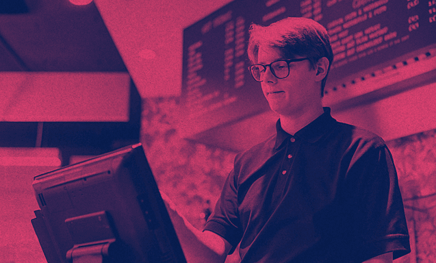 A student working at a counter.